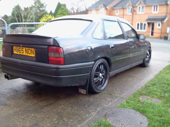 rear window spoiler going on and grey wheels plus sri door strips off
